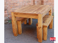 Custom made Junk leg on this table is positioned on the outer edges leaving flexibilty for additional seating