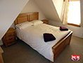 Solid Oak Panelled Bed