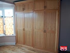 Handmade Bespoke Oak 4 Door Wardrobe With Top Storage Boxes Custom Made By Incite Interiors At Our Derbyshire Listed Mill Workshop, Oak bedroom Furniture, Oak Dining Room Furniture, Oak Kitchen Furniture, Solid Wooden Furniture Derby  